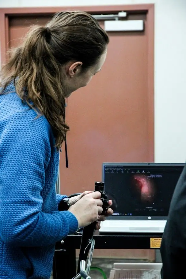 Technician reviewing a digital radiograph