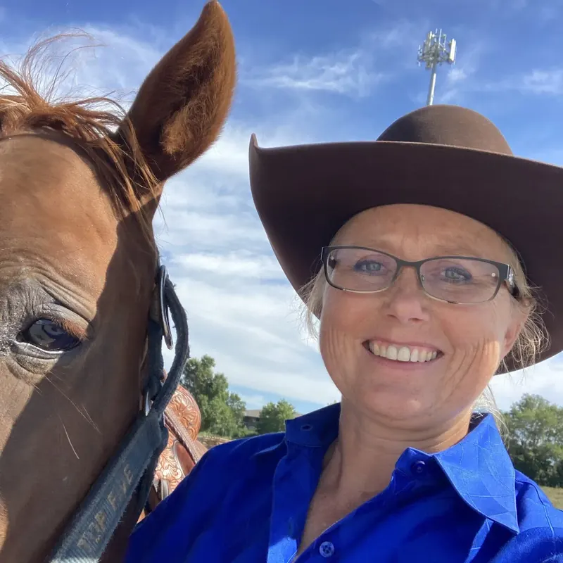 Dr. Amy Cook with a horse